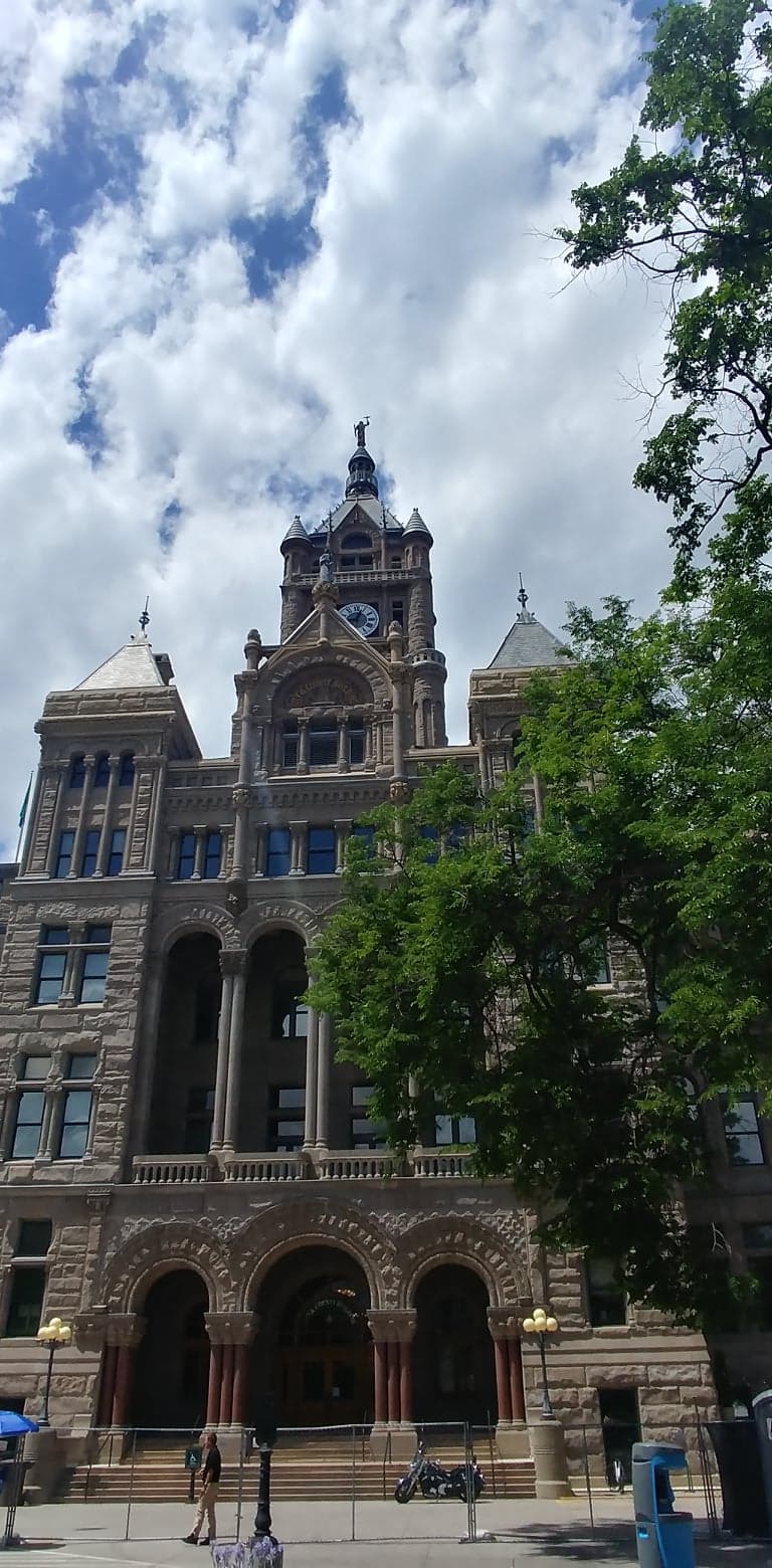 The historic Salt Lake City and County Building framed by trees